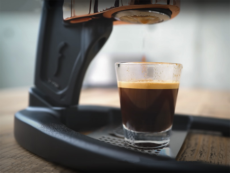 Freshly made shot of espresso sitting on the Flair Signature's drip tray