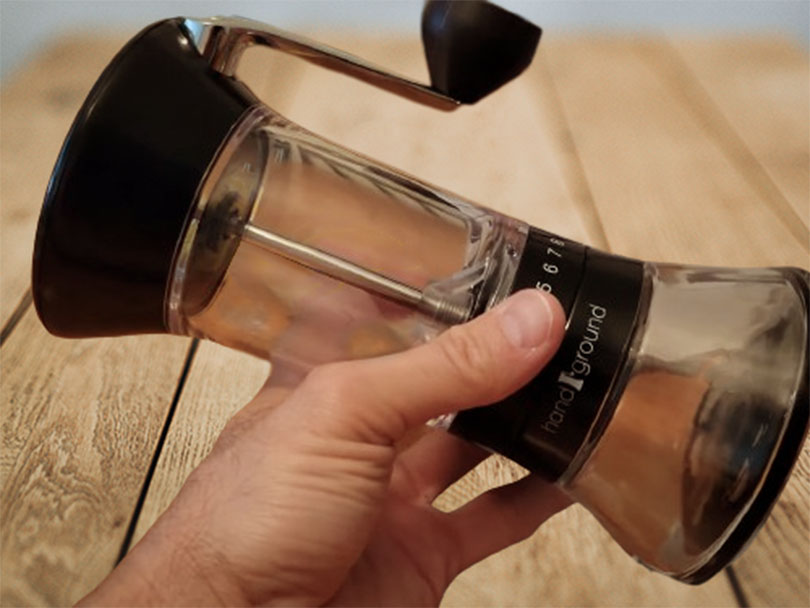 Hand holding the Handground Precision grinder