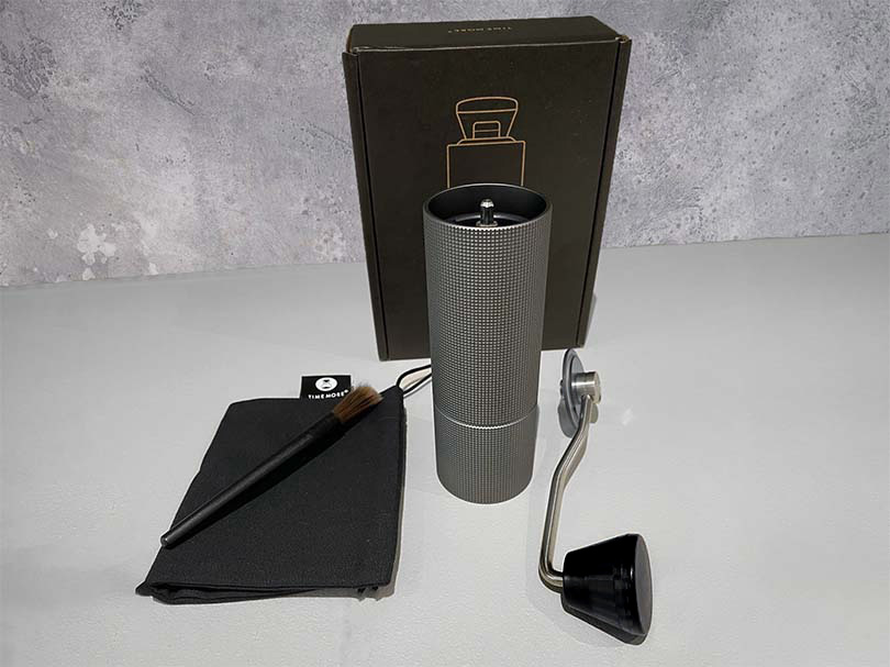 Timemore C2 on table with box and carry bag