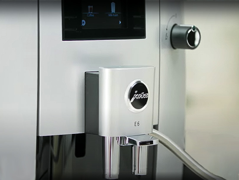 Close up of the Jura E6 logo and branding