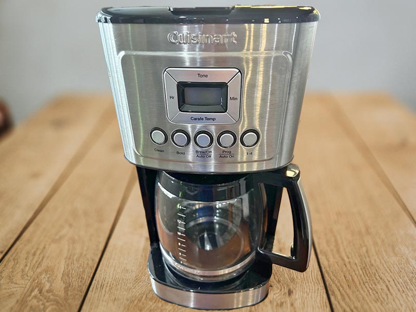 Cuisinart 14 Cup Coffee Maker, turned off and sitting on a wooden table