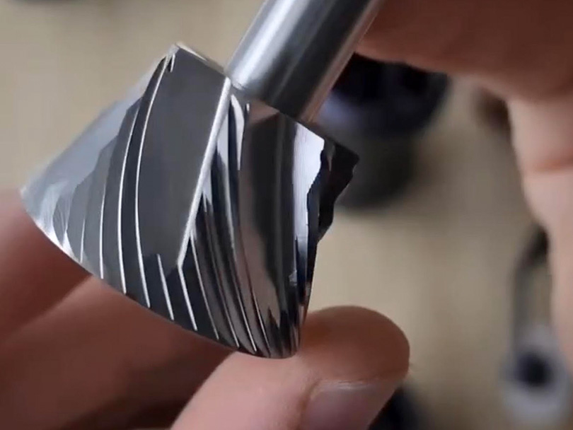 Close-up of the 48mm stainless steel heptagonal burrs of the K Ultra manual grinder