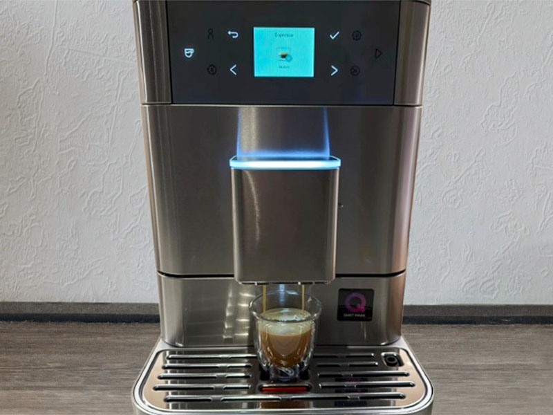 The KitchenAid KF6 making a shot of espresso