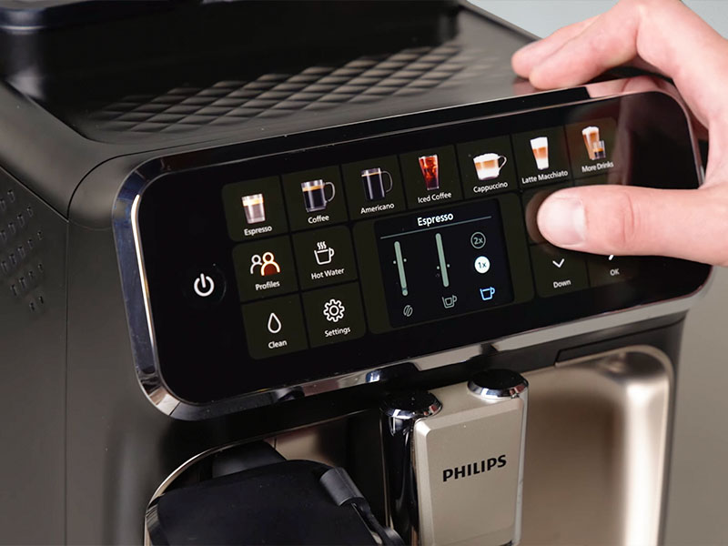 Close-up of a hand selecting single or double espresso shot on the Philips 4400