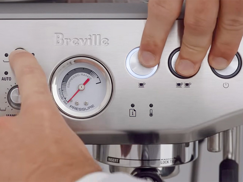 Entering advanced temperature control mode on the Breville Barista Express Impress by pressing 4 out of the 5 buttons on the machine at the same time