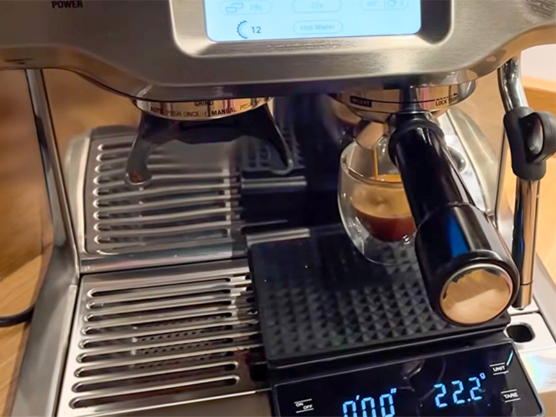 Dialling in the Breville Barista Touch by placing a scale under the espresso cup on the drip tray